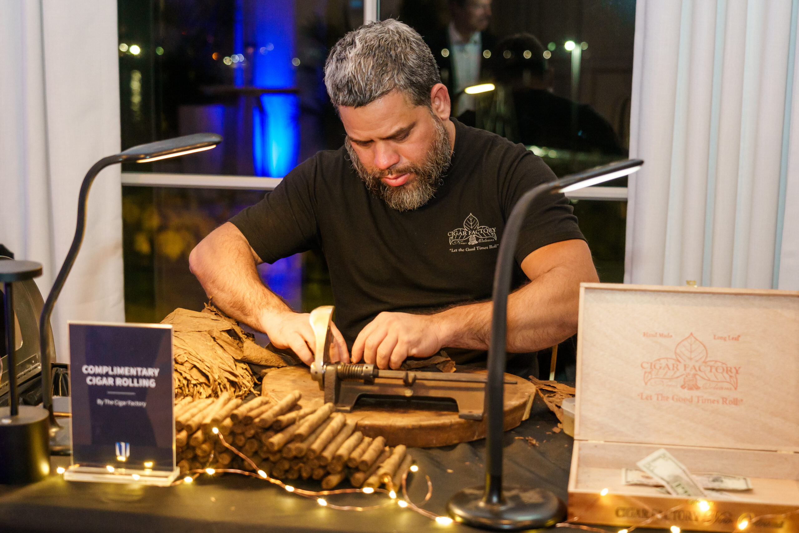 Dave Cantin Group custom cigar roller at event