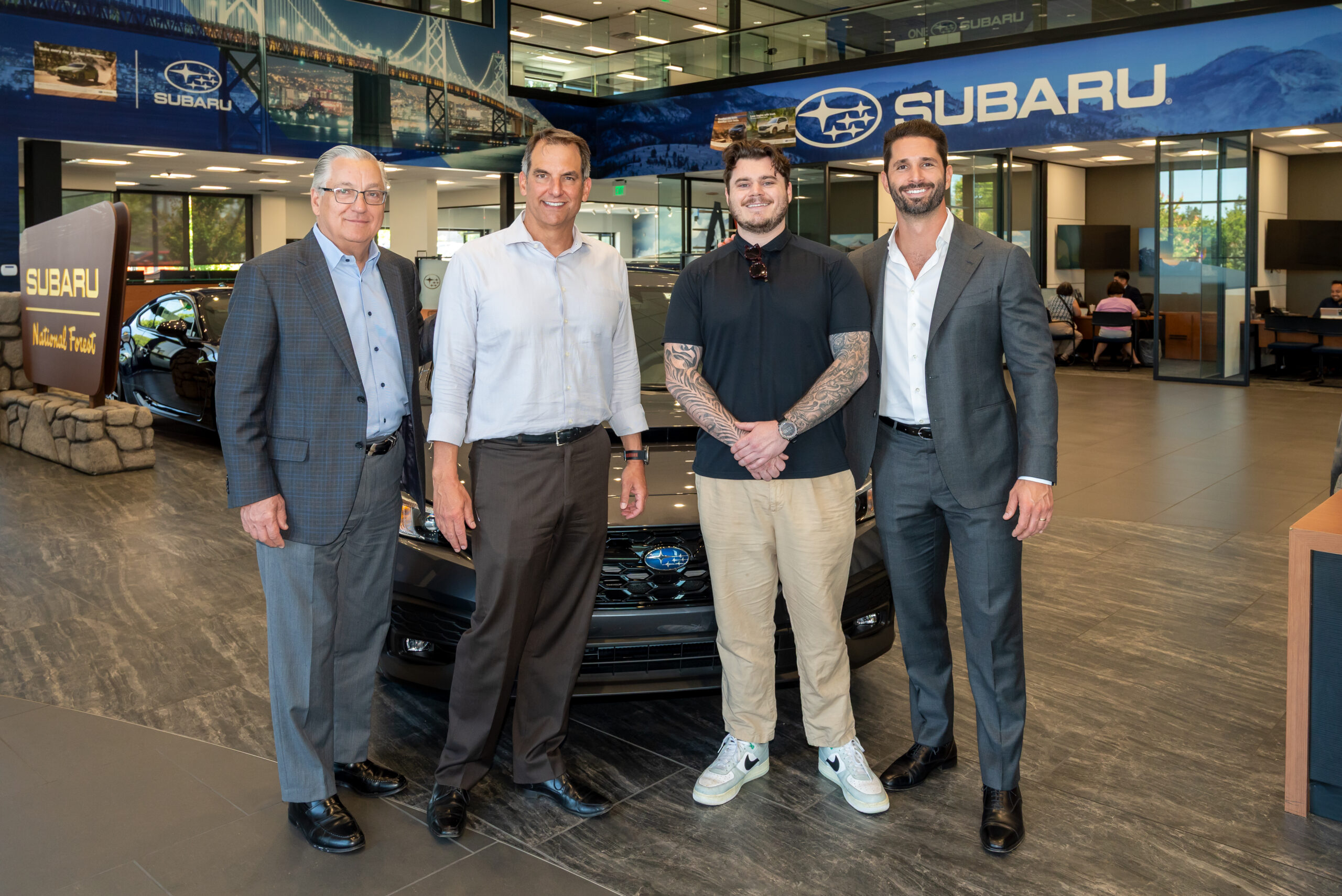 Tony Karabon and Alex Covino at a Subaru dealership